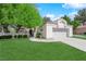 Attractive single-story home with a well-manicured lawn and a convenient two-car garage at 240 Windsong Dr, Henderson, NV 89074