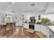 Bright eat-in kitchen features granite countertops, white cabinets, and stainless steel appliances at 240 Windsong Dr, Henderson, NV 89074