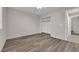 Bedroom with wood-look laminate flooring and a closet at 2514 Tropical Sands Ave, North Las Vegas, NV 89031