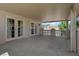 View of a covered balcony, complete with balustrade and double french doors offering great outdoor living at 2595 Aviv Ct, Las Vegas, NV 89121
