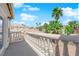 Balcony with views of the community, mature trees, and blue skies at 2595 Aviv Ct, Las Vegas, NV 89121