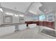 Bright bathroom boasts a soaking tub, a walk-in shower, and dual vanities at 2595 Aviv Ct, Las Vegas, NV 89121