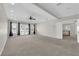 Expansive bonus room featuring a ceiling fan, recessed lighting, and balcony access at 2595 Aviv Ct, Las Vegas, NV 89121