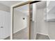 The walk-in closet has neutral carpet, shelving, and metal clothes rods at 2595 Aviv Ct, Las Vegas, NV 89121