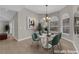 Cozy dining area featuring neutral paint, plenty of natural light, and modern decor at 2595 Aviv Ct, Las Vegas, NV 89121