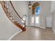 Grand foyer with curved staircase and high ceilings at 2595 Aviv Ct, Las Vegas, NV 89121