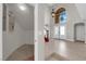 Bright foyer with staircase and chandelier at 2595 Aviv Ct, Las Vegas, NV 89121