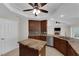 Stylish kitchen features granite countertops, stainless steel appliances, and wood cabinetry at 2595 Aviv Ct, Las Vegas, NV 89121