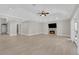 Open concept living room features tile floors, fireplace and recessed lighting at 2595 Aviv Ct, Las Vegas, NV 89121
