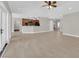 Open-concept living room with tile flooring offers easy access to the kitchen at 2595 Aviv Ct, Las Vegas, NV 89121