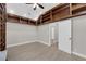 Bright office features custom built-in bookshelves and tile flooring at 2595 Aviv Ct, Las Vegas, NV 89121
