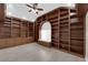 Cozy office features custom built-in bookshelves at 2595 Aviv Ct, Las Vegas, NV 89121