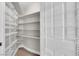 Walk-in pantry with ample shelving for organized storage at 2595 Aviv Ct, Las Vegas, NV 89121