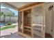 Infrared sauna on a covered patio with a backyard pool view at 2595 Aviv Ct, Las Vegas, NV 89121