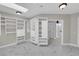 Spacious walk-in closet with ample shelving, built-in drawers, and natural light at 2595 Aviv Ct, Las Vegas, NV 89121