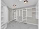 Spacious walk-in closet with ample shelving, built-in drawers, and custom organizers at 2595 Aviv Ct, Las Vegas, NV 89121