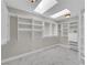 Spacious walk-in closet with ample shelving, built-in drawers, and lots of natural light at 2595 Aviv Ct, Las Vegas, NV 89121