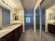 Bathroom featuring dark wood cabinets and granite countertop at 2606 S Durango Dr # 171, Las Vegas, NV 89117