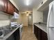 Efficient kitchen boasts tile flooring and a bright, airy feel at 2606 S Durango Dr # 171, Las Vegas, NV 89117