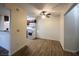 Cozy living space featuring updated floors and a view of the kitchen at 2606 S Durango Dr # 171, Las Vegas, NV 89117