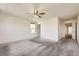 Bright bedroom with carpet, ceiling fan, and ample space at 2862 Starling Summit St, Henderson, NV 89044