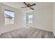 Bedroom with carpet, ceiling fan, and bright natural light at 2862 Starling Summit St, Henderson, NV 89044