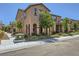 Two-story home exterior featuring a landscaped front yard and covered entrance at 2862 Starling Summit St, Henderson, NV 89044