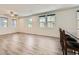 Open living space with hardwood floors offering room for dining, living, and entertaining at 2862 Starling Summit St, Henderson, NV 89044