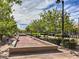 Community game area with bocce ball court, seating, and landscaping at 2936 Aragon Terrace Way, Henderson, NV 89044
