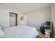 Neutral bedroom with wood-look floors, closet, and doorway to ensuite bathroom at 3012 Haddon Dr, Las Vegas, NV 89134