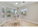 Cozy dining area with bay windows provides ample natural light and views of the surrounding neighborhood at 3012 Haddon Dr, Las Vegas, NV 89134