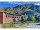 Beautiful hotel view with mountains and a scenic pond featuring a central fountain at 3012 Haddon Dr, Las Vegas, NV 89134