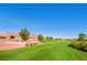 Expansive golf course with green grass, mature trees, and mountain views at 3012 Haddon Dr, Las Vegas, NV 89134