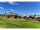 Stunning view of golf course with mountain views in the background and desert landscaping at 3012 Haddon Dr, Las Vegas, NV 89134