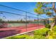 Community fenced in tennis courts surrounded by lush greenery at 3012 Haddon Dr, Las Vegas, NV 89134