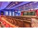View of community theater room with stage, curtains, and multiple rows of seating at 3012 Haddon Dr, Las Vegas, NV 89134