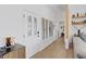 Inviting foyer with natural light, stylish front door, and open access to the living areas with decorative shelves at 3024 Lotus Hill Dr, Las Vegas, NV 89134