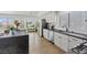 Bright kitchen with stainless steel appliances, granite countertops, and a garden view at 3024 Lotus Hill Dr, Las Vegas, NV 89134
