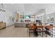 Spacious living and dining area with open layout, fireplace, and modern decor at 3024 Lotus Hill Dr, Las Vegas, NV 89134