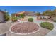 Charming single-story home featuring a low-maintenance rock garden and well-manicured landscaping at 3056 Monroe Park Rd, Henderson, NV 89052