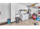 Attached garage featuring a laundry area, sink, and ample storage space at 3056 Monroe Park Rd, Henderson, NV 89052