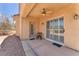 Covered patio with ceiling fan, sliding glass doors, and view of backyard at 3056 Monroe Park Rd, Henderson, NV 89052