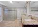 Bright bathroom features a spacious glass shower and dual sink vanity with granite counters at 3079 Evening Mist Ave, Henderson, NV 89052