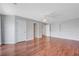 Large bedroom featuring hardwood floors, neutral paint and ample space for furniture at 3079 Evening Mist Ave, Henderson, NV 89052