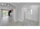 Hallway with white marble flooring and wrought iron decor leads to living area and rooms at 3079 Evening Mist Ave, Henderson, NV 89052