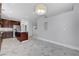 Large living area with marble floors and a kitchen with wood cabinets at 3079 Evening Mist Ave, Henderson, NV 89052
