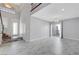 Bright, spacious living room with marble floors, high ceilings and lots of natural light at 3079 Evening Mist Ave, Henderson, NV 89052