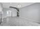 Open floor plan living room with marble floors and decorative arches at 3079 Evening Mist Ave, Henderson, NV 89052
