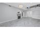 Spacious living room featuring marble floors, a fireplace and decorative arches at 3079 Evening Mist Ave, Henderson, NV 89052