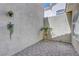 Enclosed patio features brick floors and decorative plants at 3079 Evening Mist Ave, Henderson, NV 89052